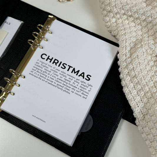 Kerst planner voorblad met een grappige definitie van kerst.