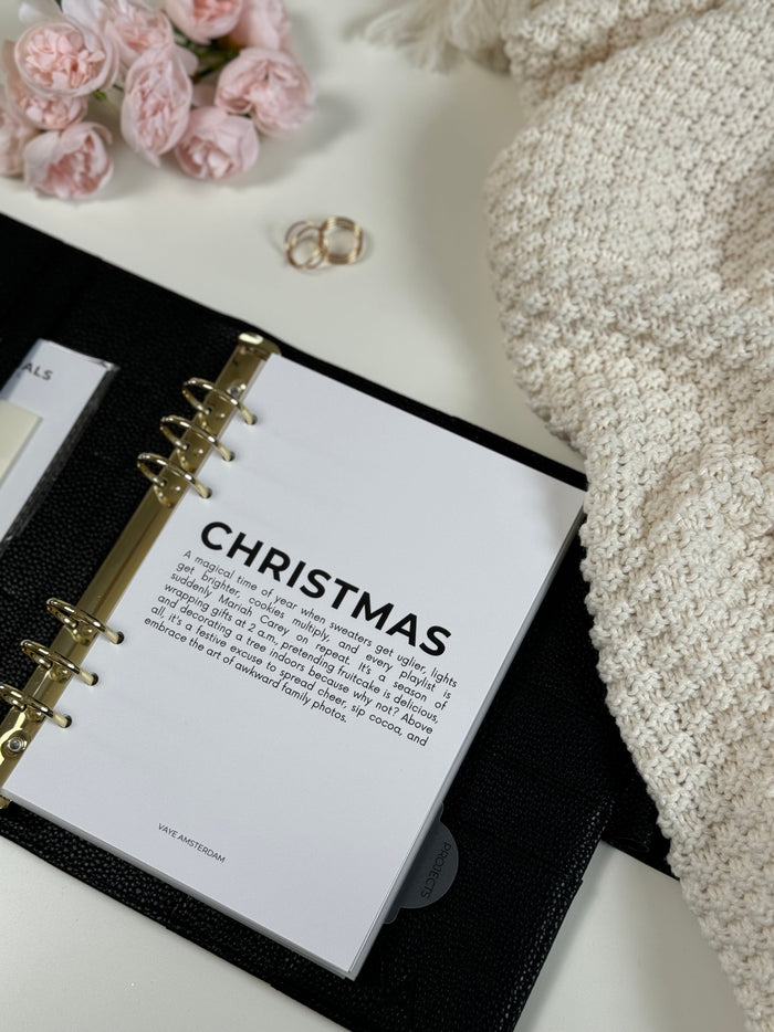 Festieve kerstplanner met ruimte voor taken, cadeaulijsten en planning voor een georganiseerde kerstperiode.